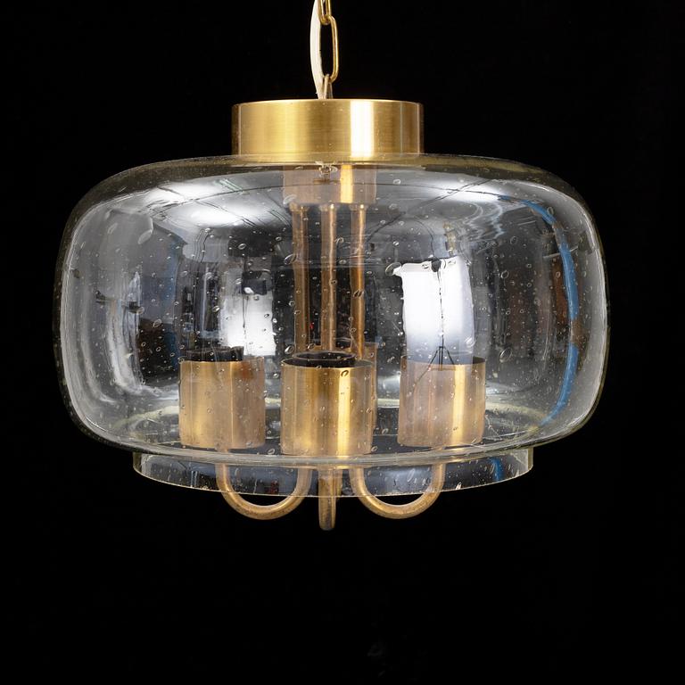 A 1960/70s glass and brass ceiling lamp.