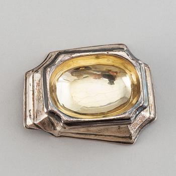 Four English early 18th century parcel-gilt silver salt-cellars, mark of Edward Wood, London 1727.
