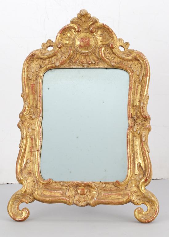 A Rococo toilette mirror.