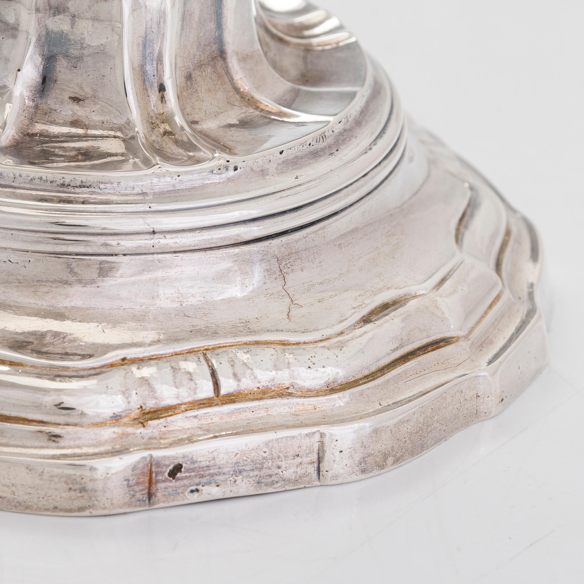 A pair of 18th-Centuty French silver candlesticks, maker's mark of Jean-Joseph Falguière (active in Dinan 1744-1773).