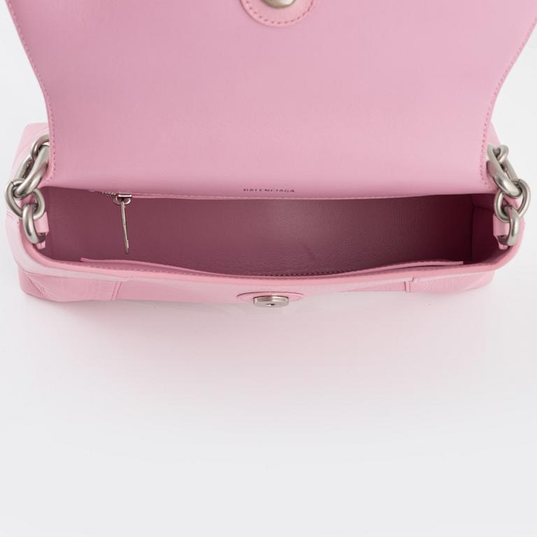 Balenciaga, a pink leather 'Downtown' bag.