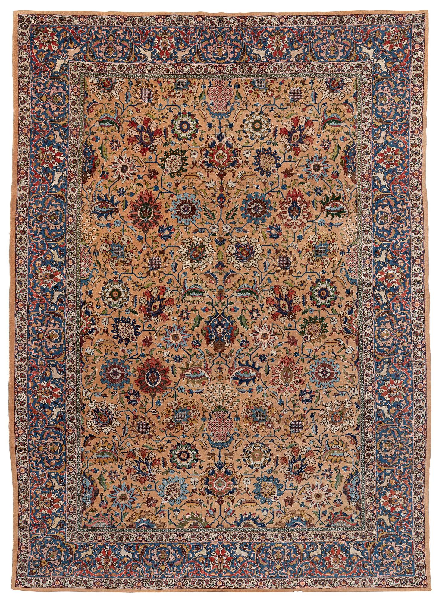 A semi-antique Tabriz carpet of vase design, West Persia, c. 404 x 292 cm.