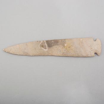 A grey flint spear head.