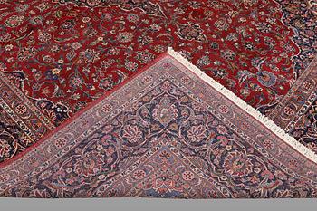 A semi-antique Keshan carpet, signed, 449 x 317 cm.