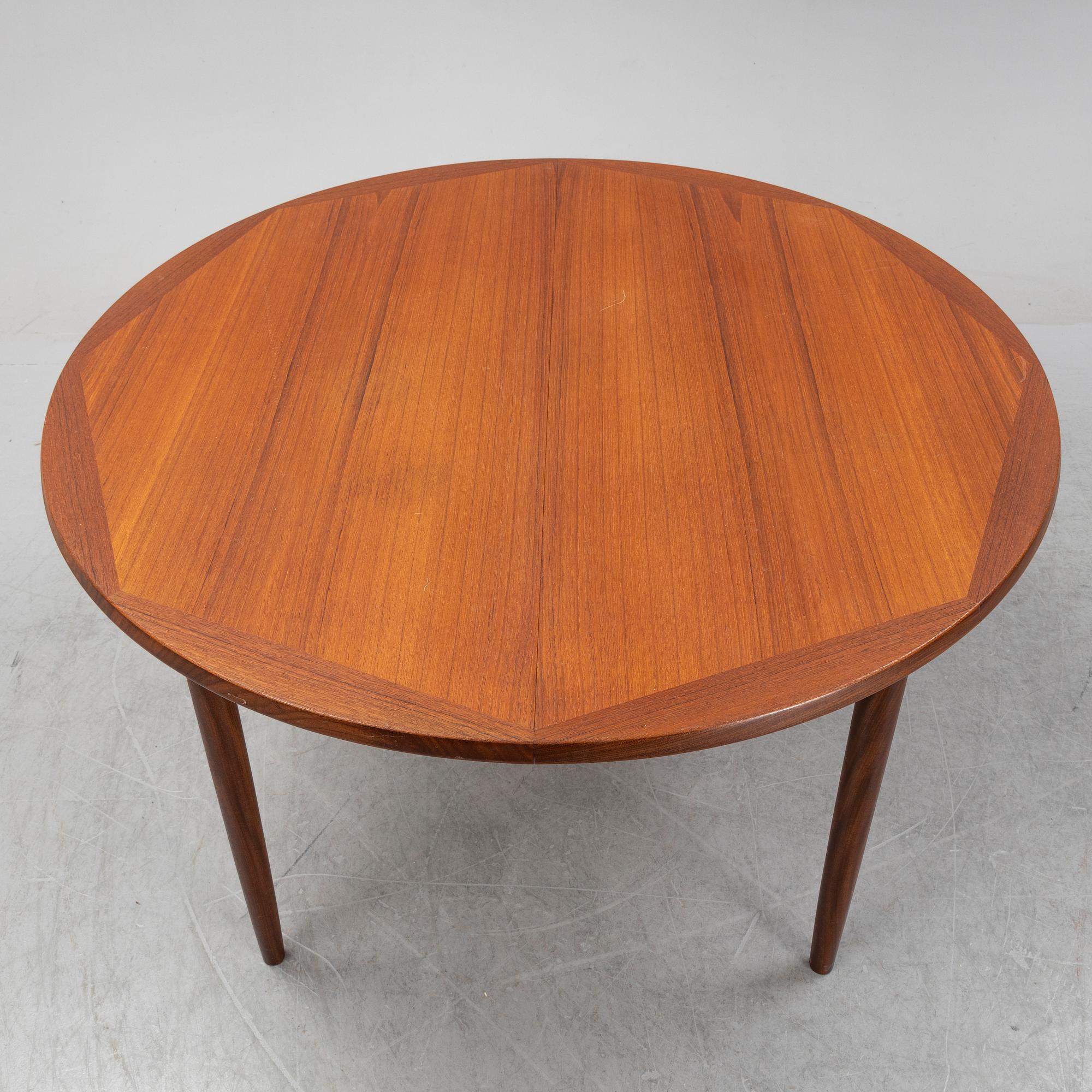 A teak 1950's/60's dining table.