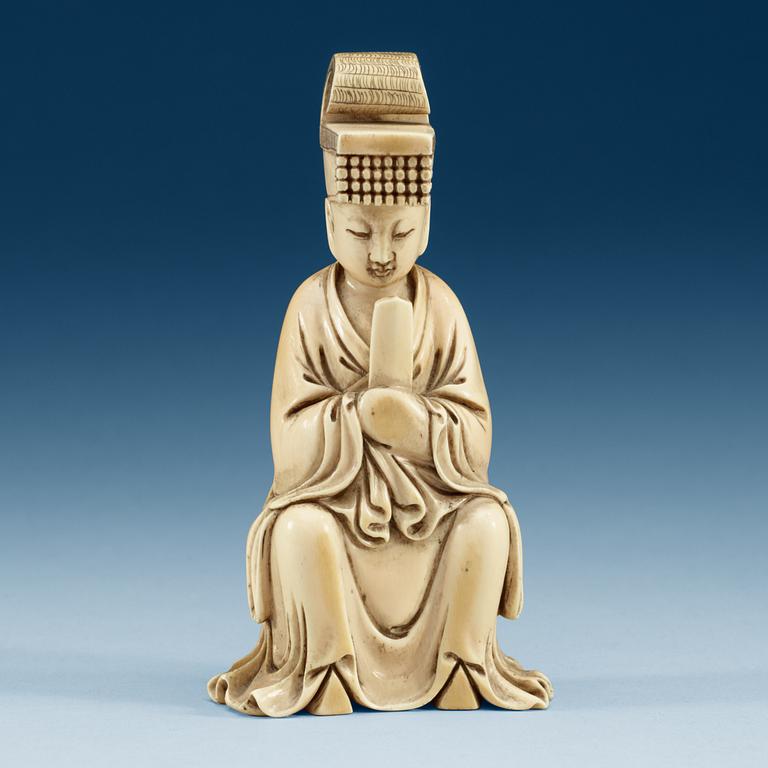 An ivory figure of a dignitary, Qing dynasty (1644-1912).