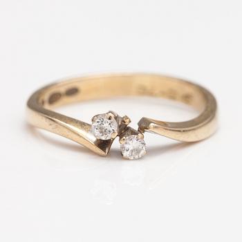 An 18K gold ring with diamonds ca. 0.12 ct in total. Finland 1974.