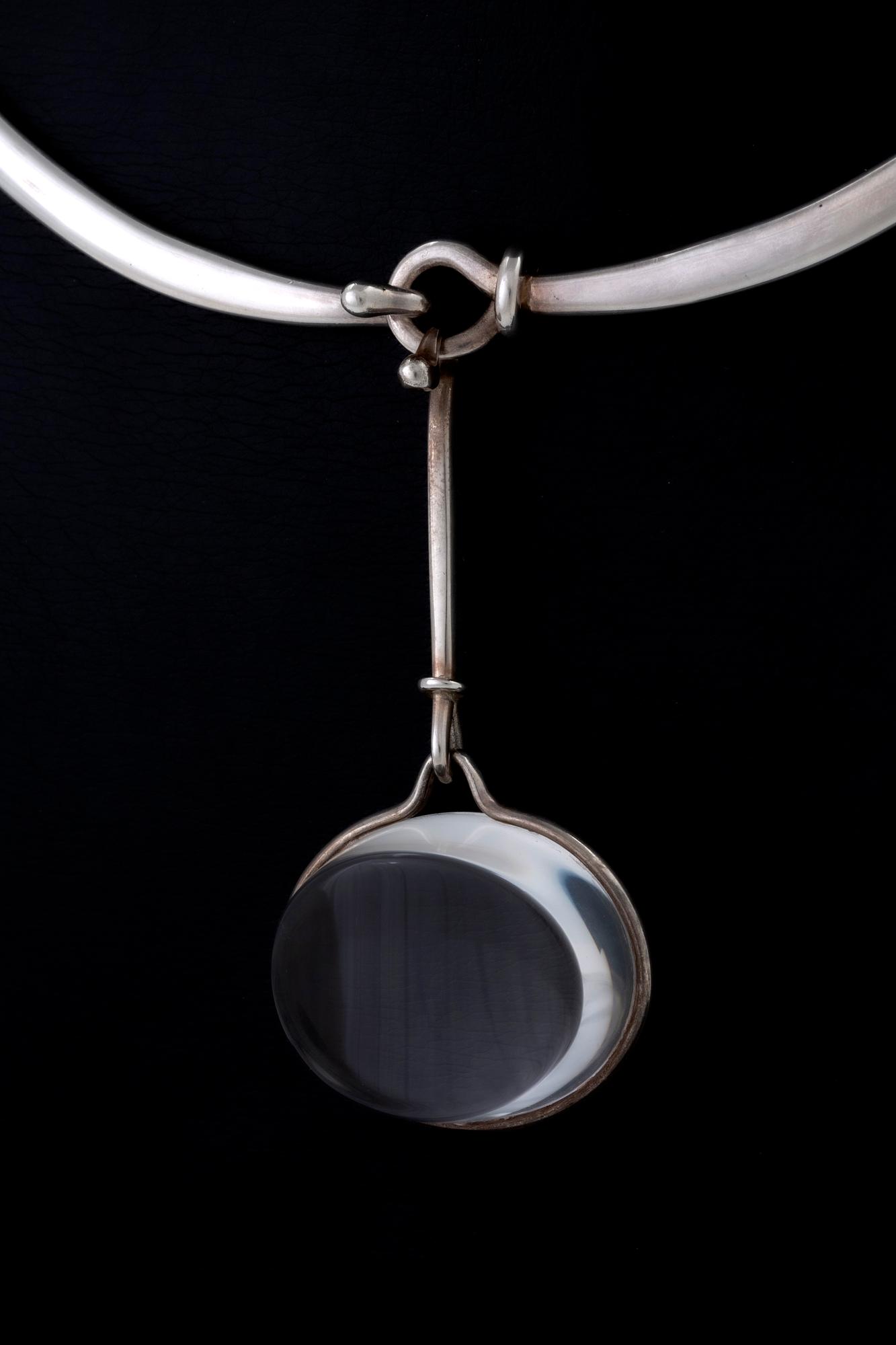 Vivianna Torun Bülow-Hübe. Necklace with pendant, sterling silver and rock crystal or glass.