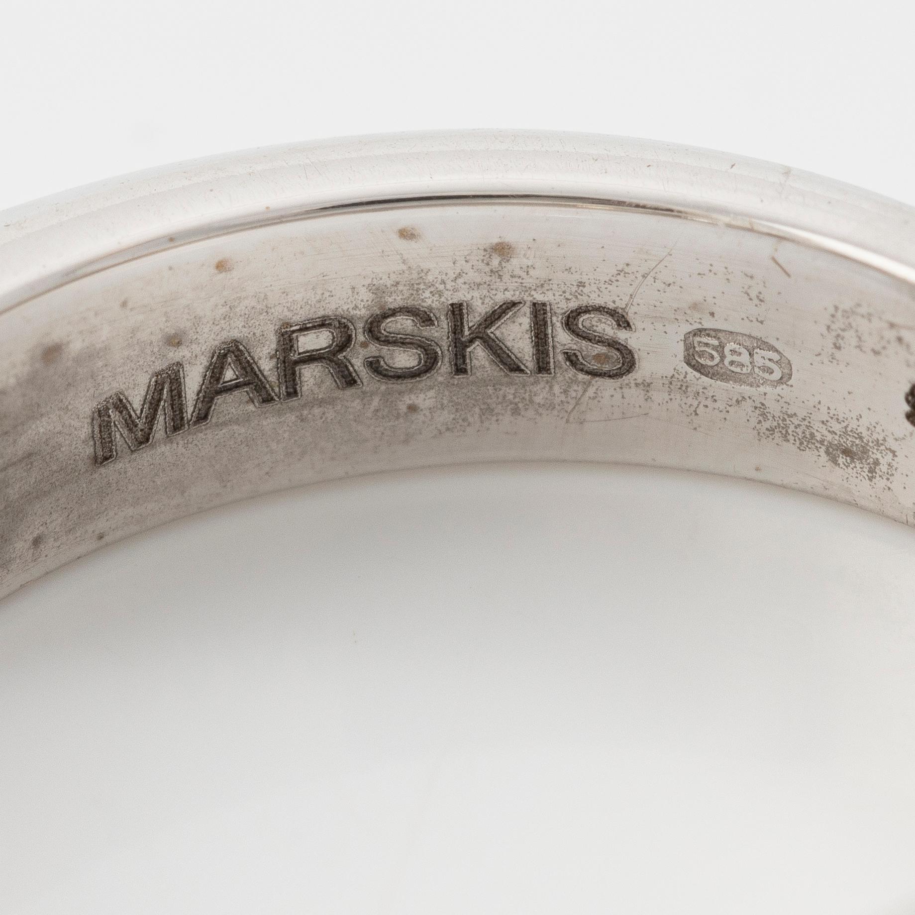 Half eternity ring in 14K white gold set with brilliant-cut diamonds.