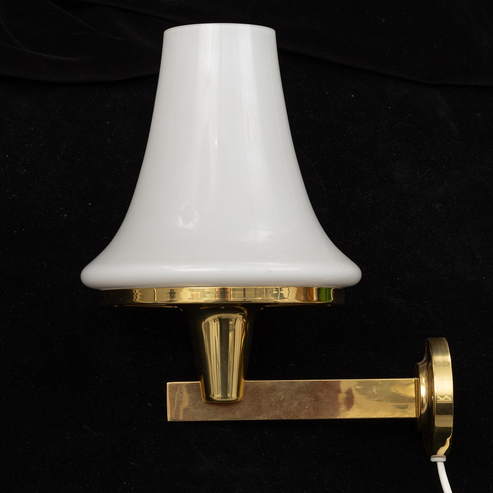 HANS-AGNE JAKOBSSON, a brass ceiling light and wall light from Markaryd, 1960's.