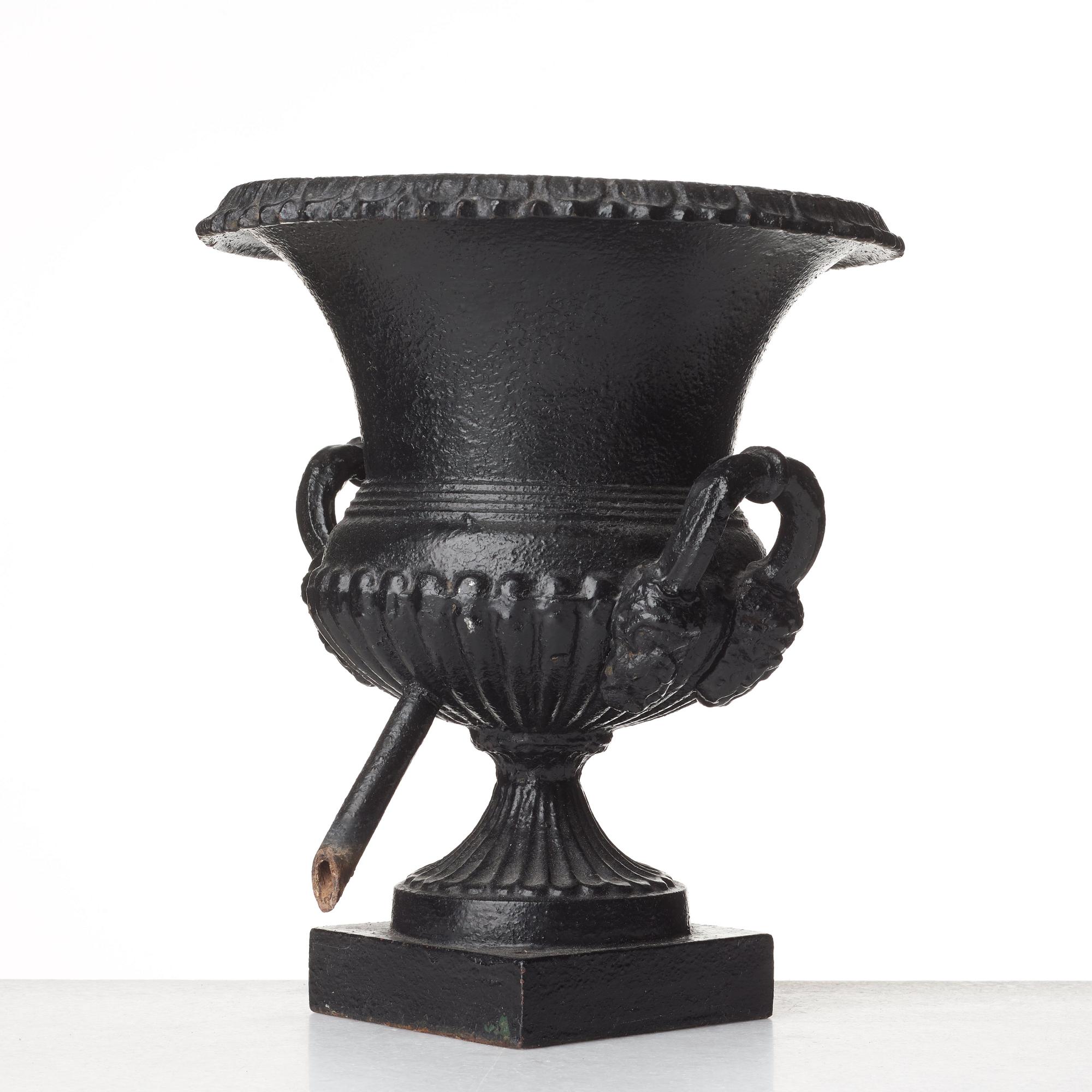 A Louis XVI-style garden urn, circa 1900.