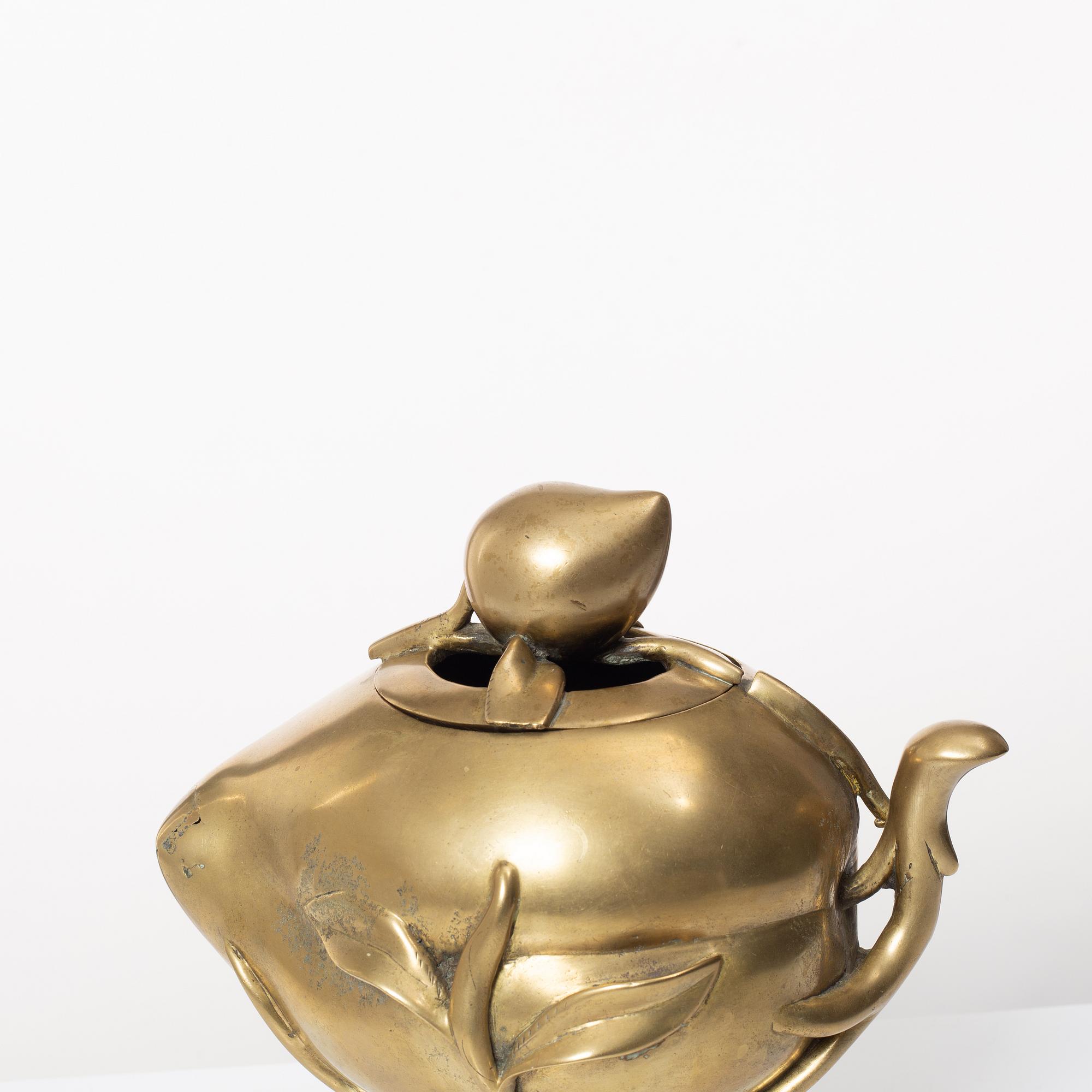 A Chinese brass 'peach' censer, first part of of the 20th century.