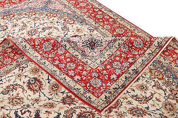 An Esfahan carpet, part silk, ca. 372 x 255 cm.