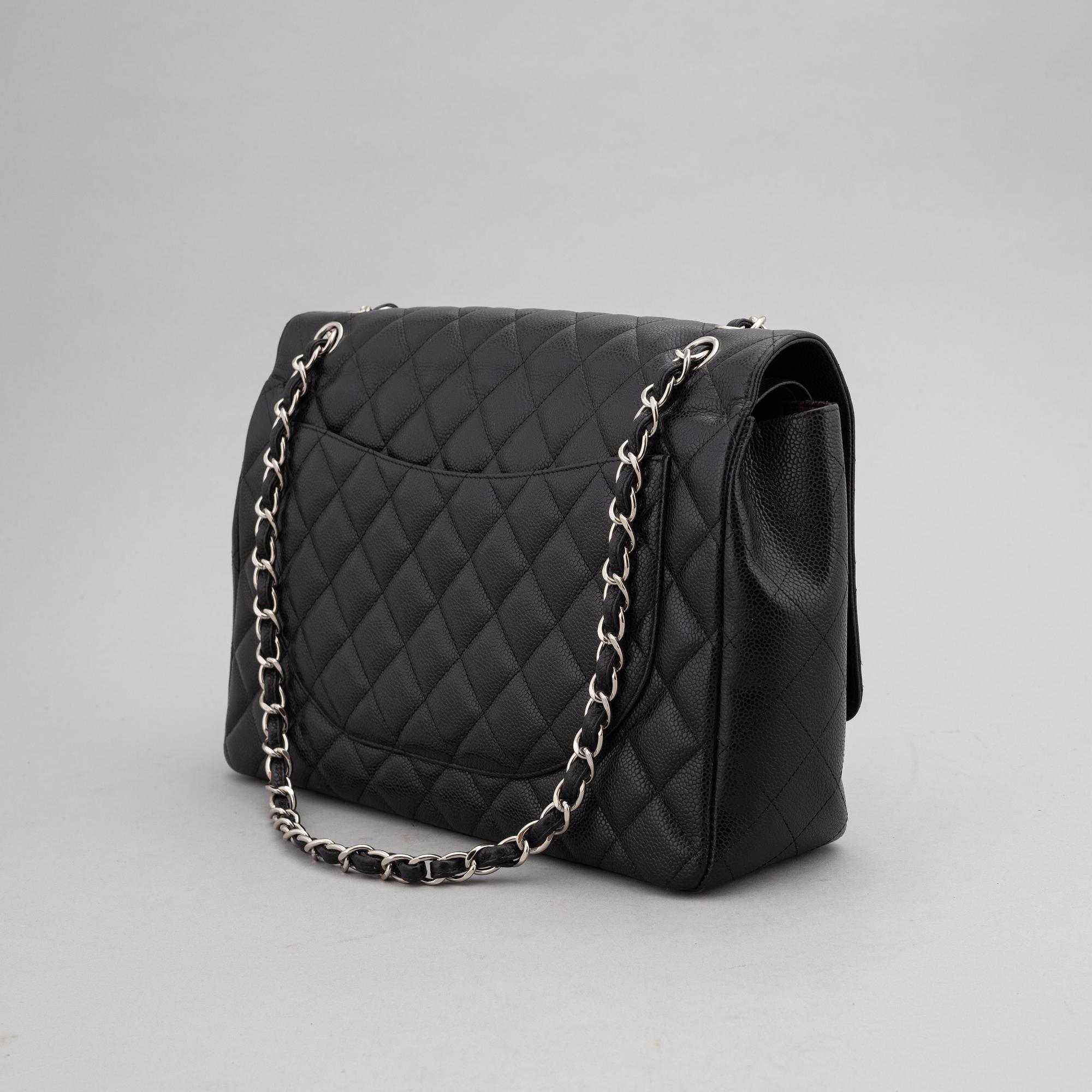Chanel, a black caviar leather 'Double Flap Bag Jumbo', 2011.