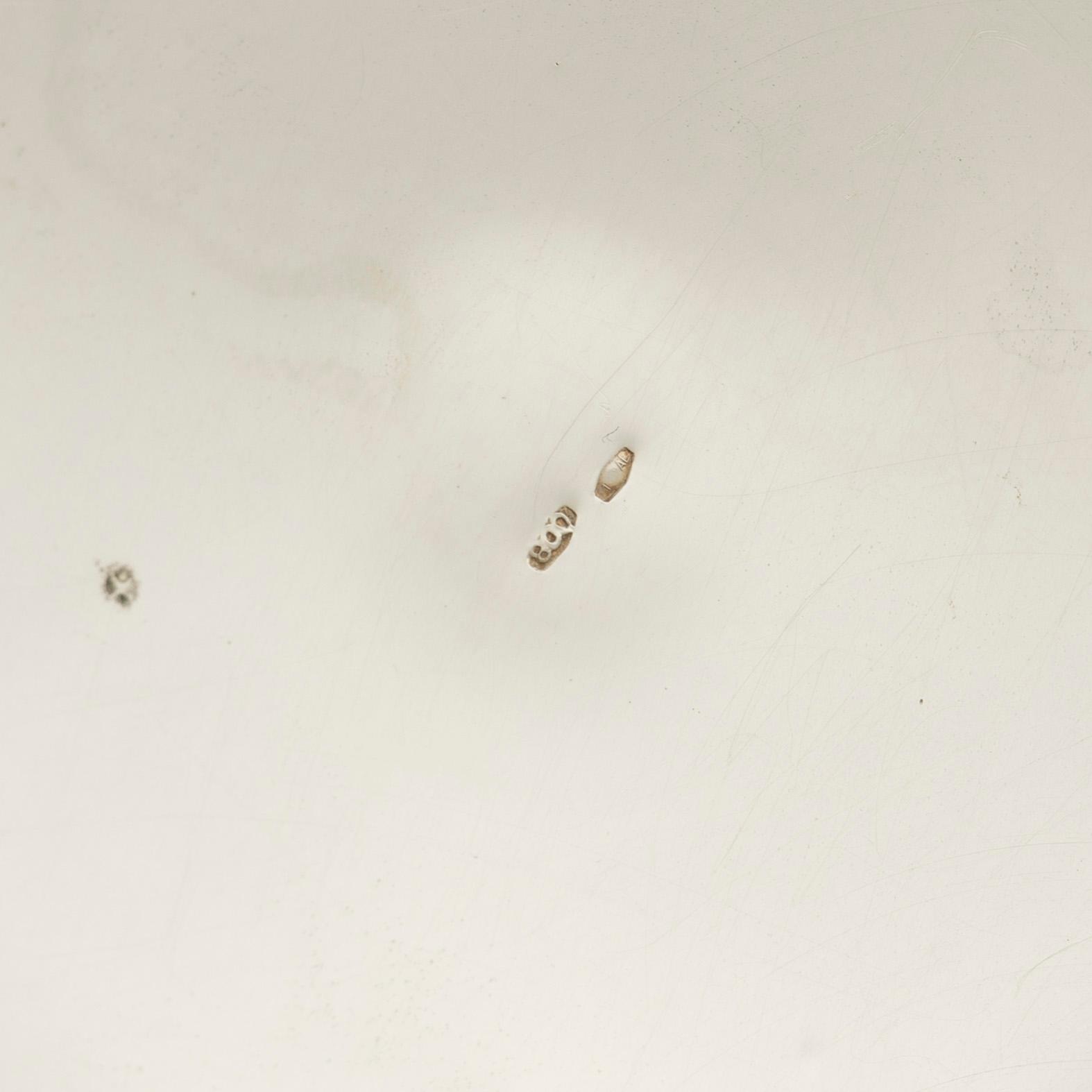 An Italian silver teapot, cream jug and sugar bowl, 20th century.