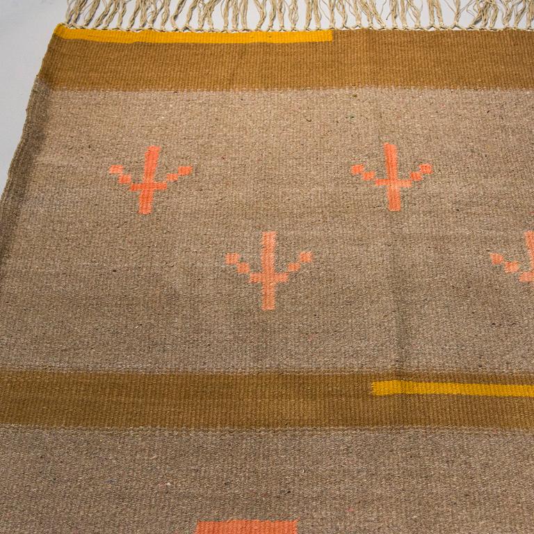 A 1930's Finnish flat weave carpet. Circa 300 x 190 cm.