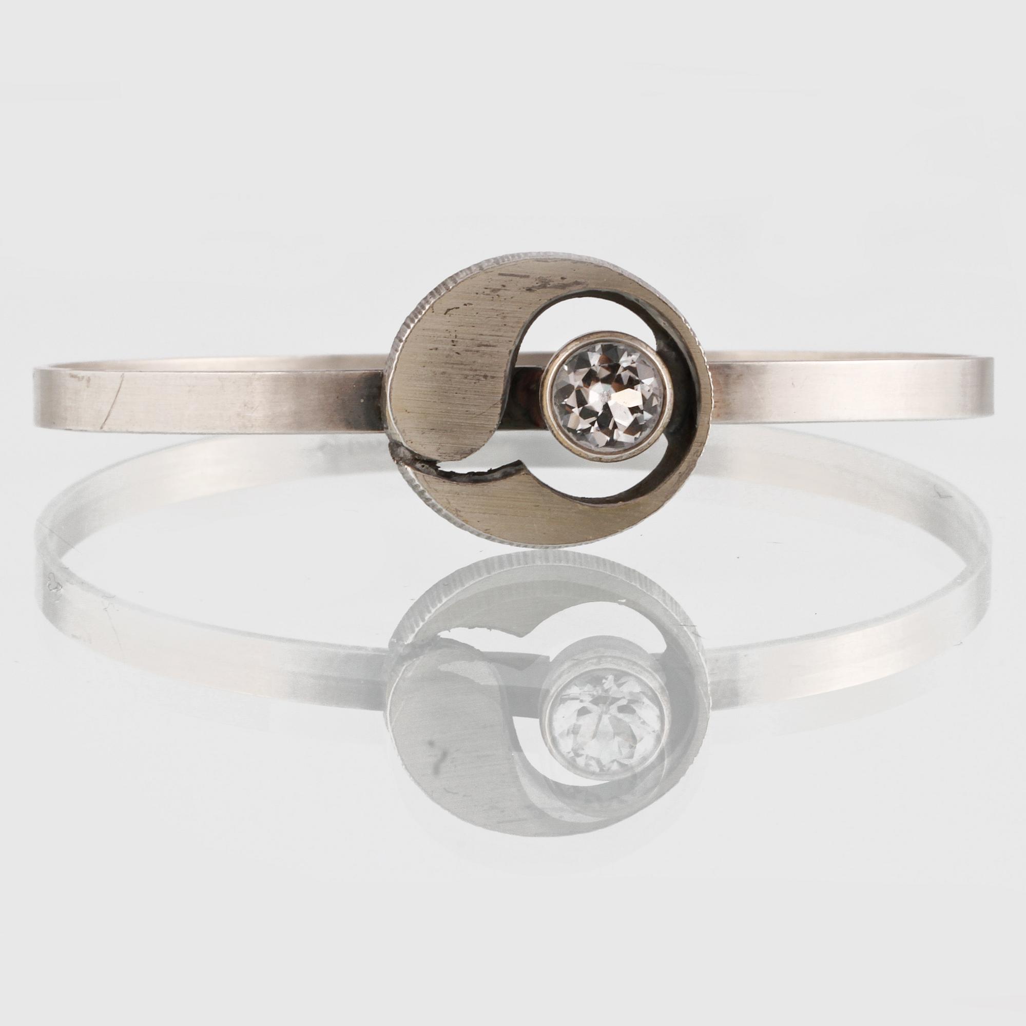 ARMRING, sterlingsilver med fasettslipad bergkristall, Sten & Laine, Turku, Finland, 1978. Vikt 9,6 gram.