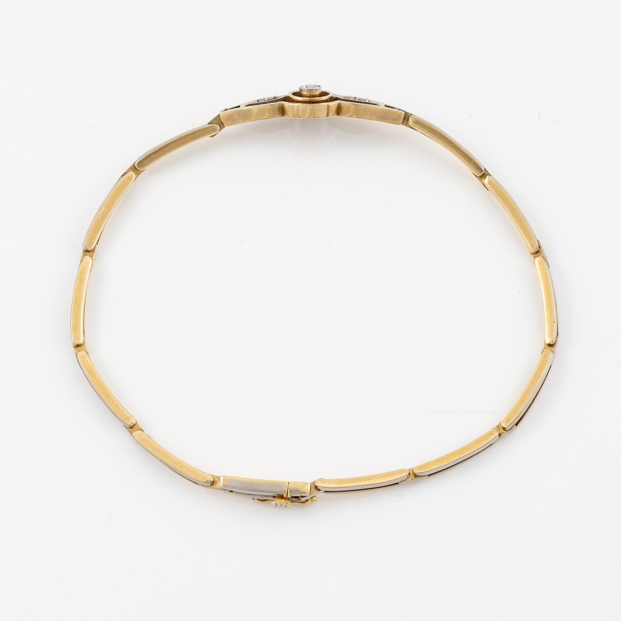 Bracelet in 14K gold set with old-cut and rose-cut diamonds.