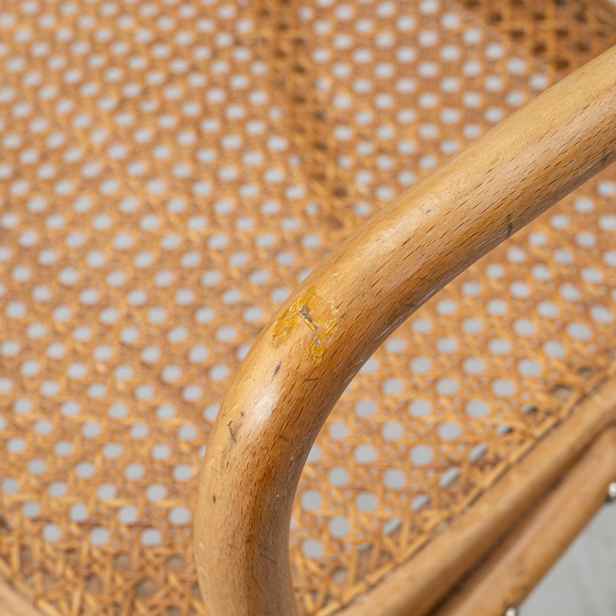 A matched pair of armchairs from Thonet, circa 1900 and late 20th Century.