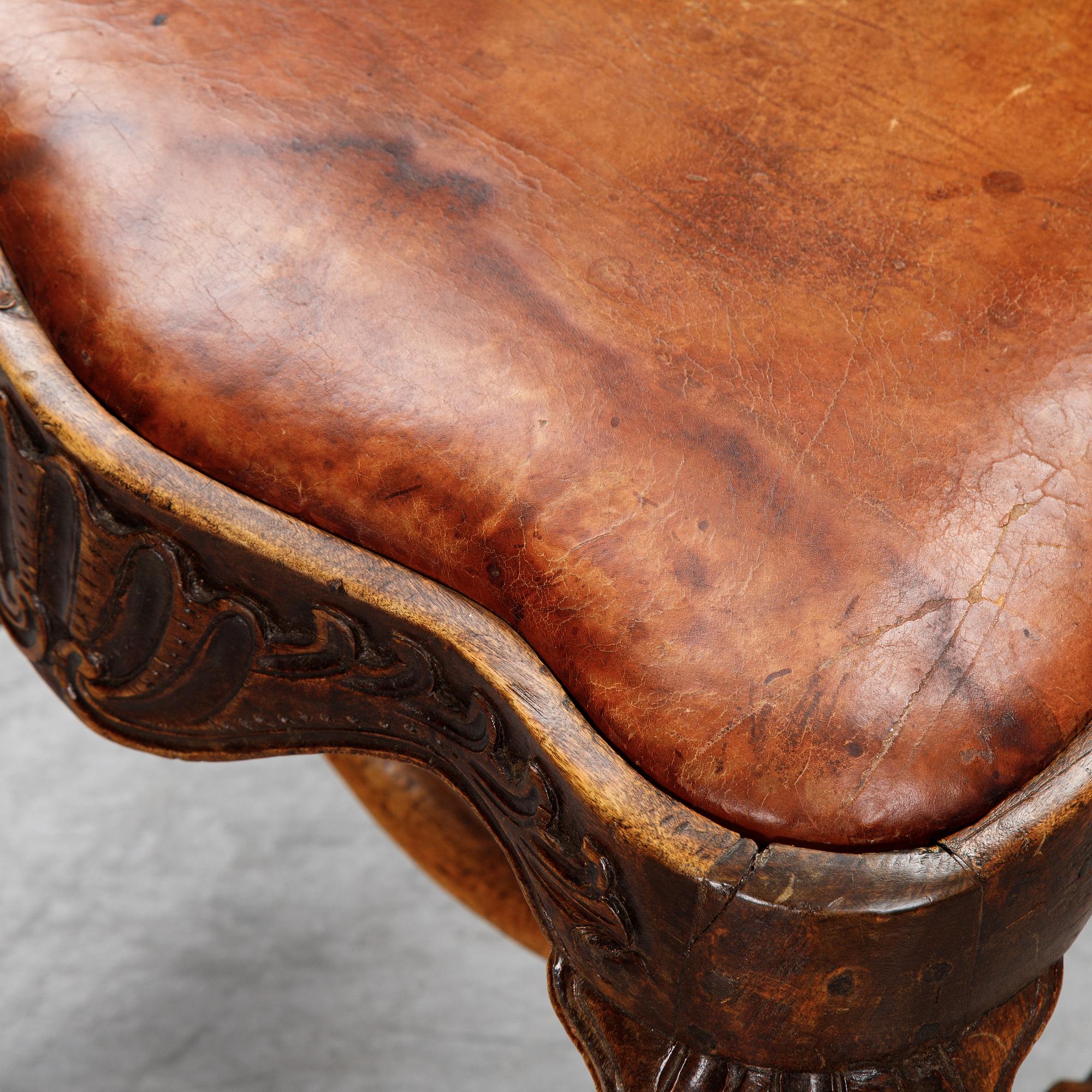 A set of nine English stained beech wood chairs, first half of the 18th Century.