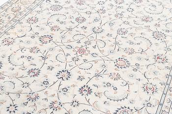 Rug, Nain, part silk, latter part of the 20th century, 293 x 198 cm.