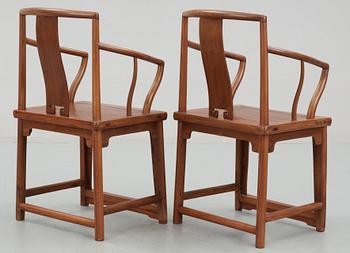 A pair of hardwood armchairs, Qing dynasty.