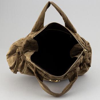 Gucci, a suede bag.