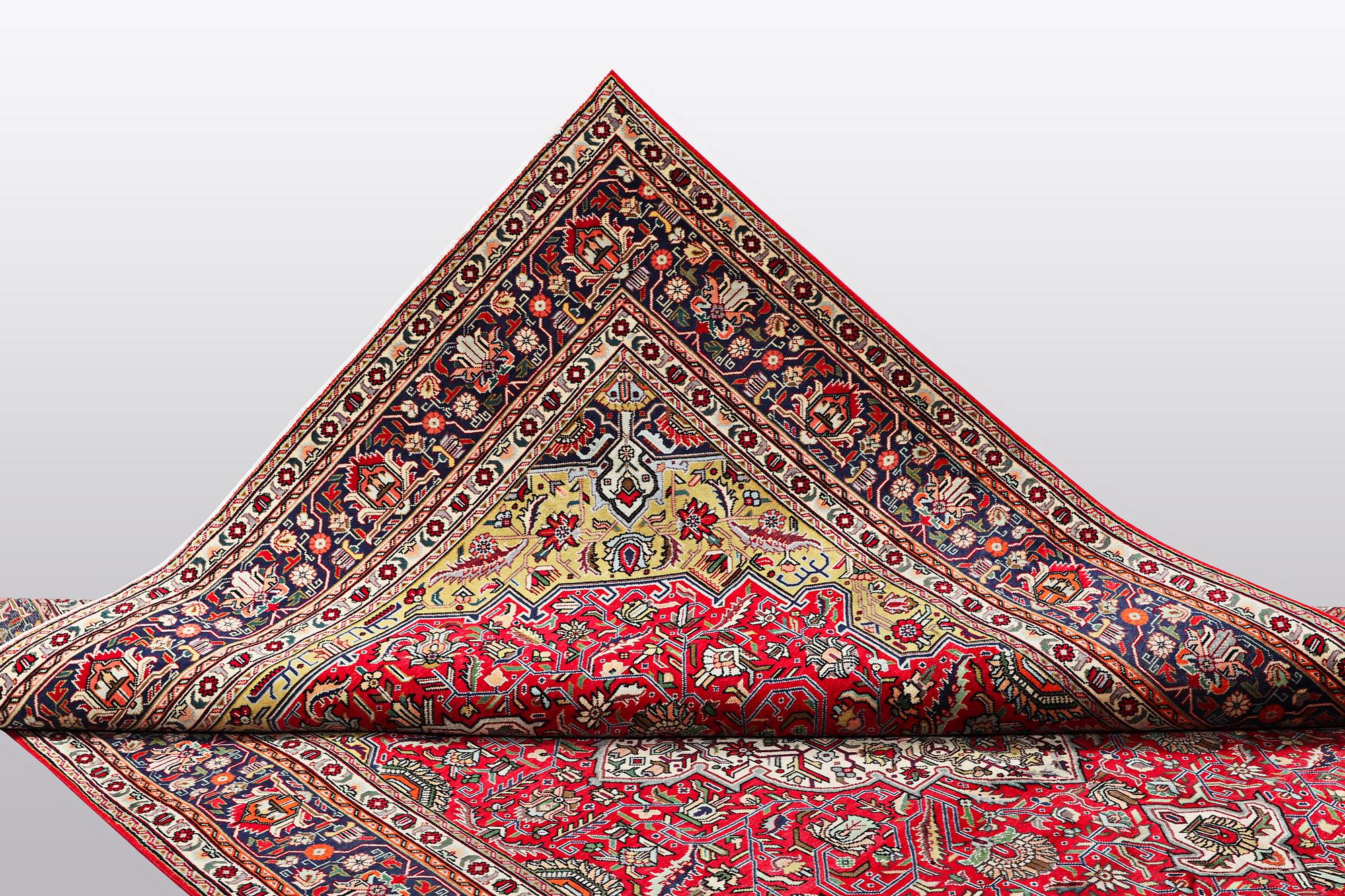 A carpet, Tabriz, ca 343 x 254 cm.