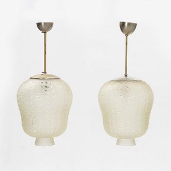 A pair of Swedish Modern ceiling lamps, 1940's.