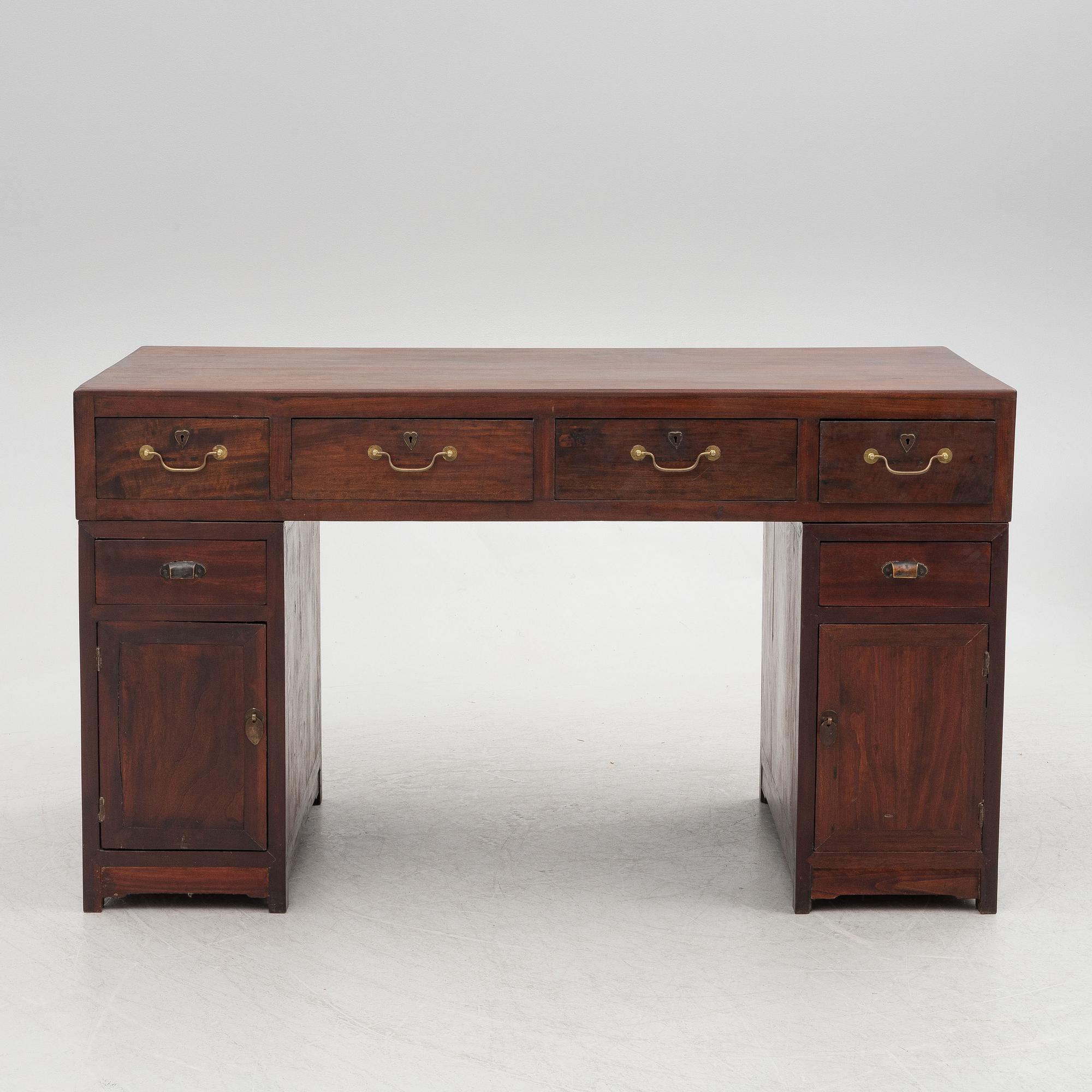 A Chinese hardwood desk, 20th century.