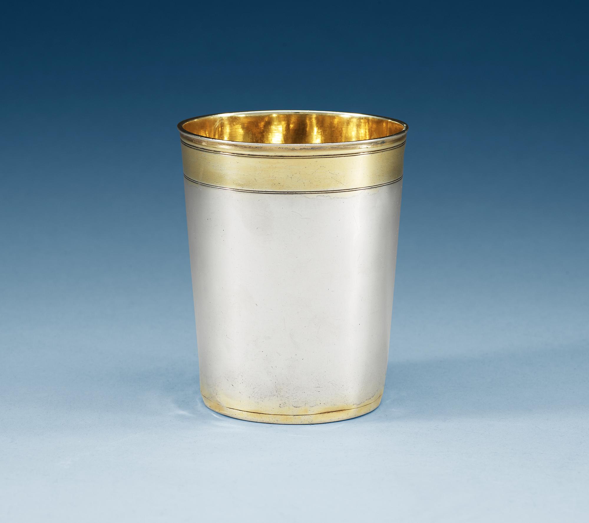 A Geraman 17th century parcel-gilt beaker, makers mark Ulrich Schnell, Augsburg 1660's.