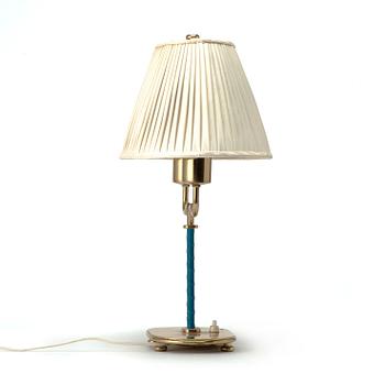 Josef Frank, a brass and blue leather table lamp, Svenskt Tenn, Sweden, model 2388.