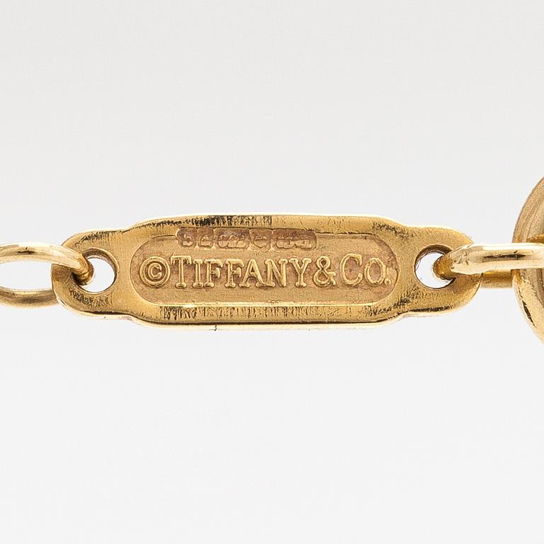 Tiffany & Co, An 18K gold necklace. Marked Tiffany & Co and T & Co.
