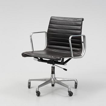 An EA 118 swivel office chair by  Charles and Ray Eames for Herman Miller, designed 1958.
