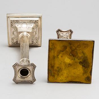 A pair of English silver plate candlesticks, probably first half of the 20th century.