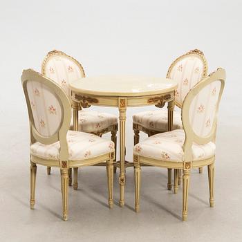 Chairs, 4 pieces, and table in Gustavian style, first half of the 20th century.