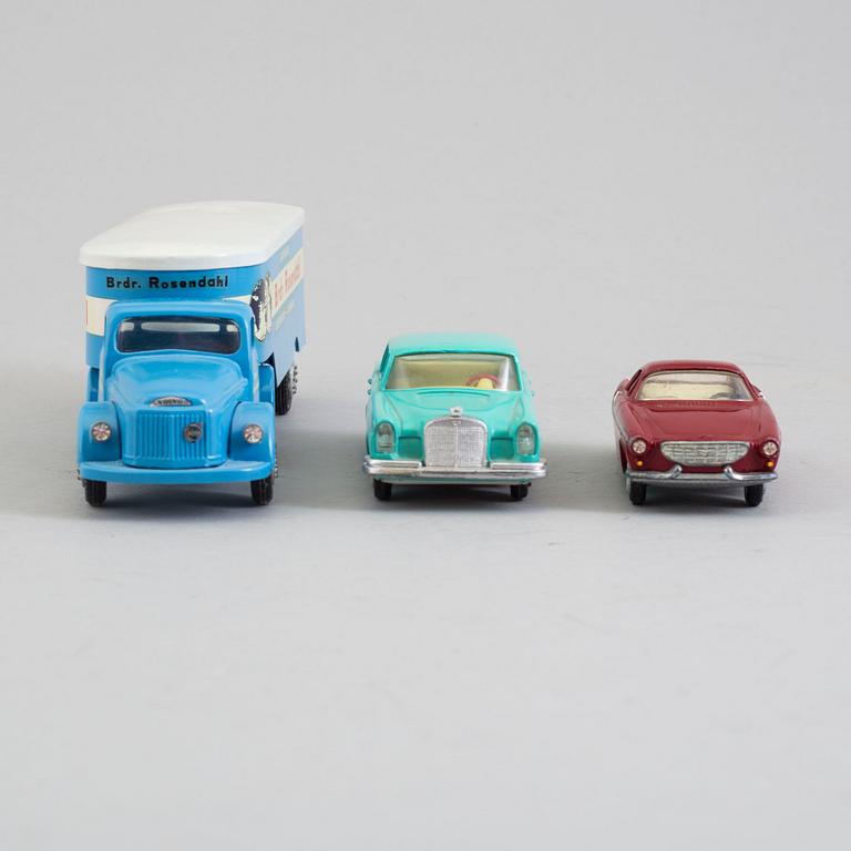 Three tin toy cars, Tekno Denmark, 1960s.