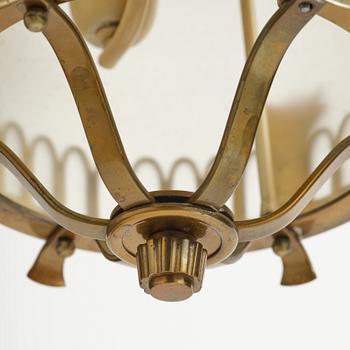 Swedish Grace, a brass and glass lamp, 1920s-40s.