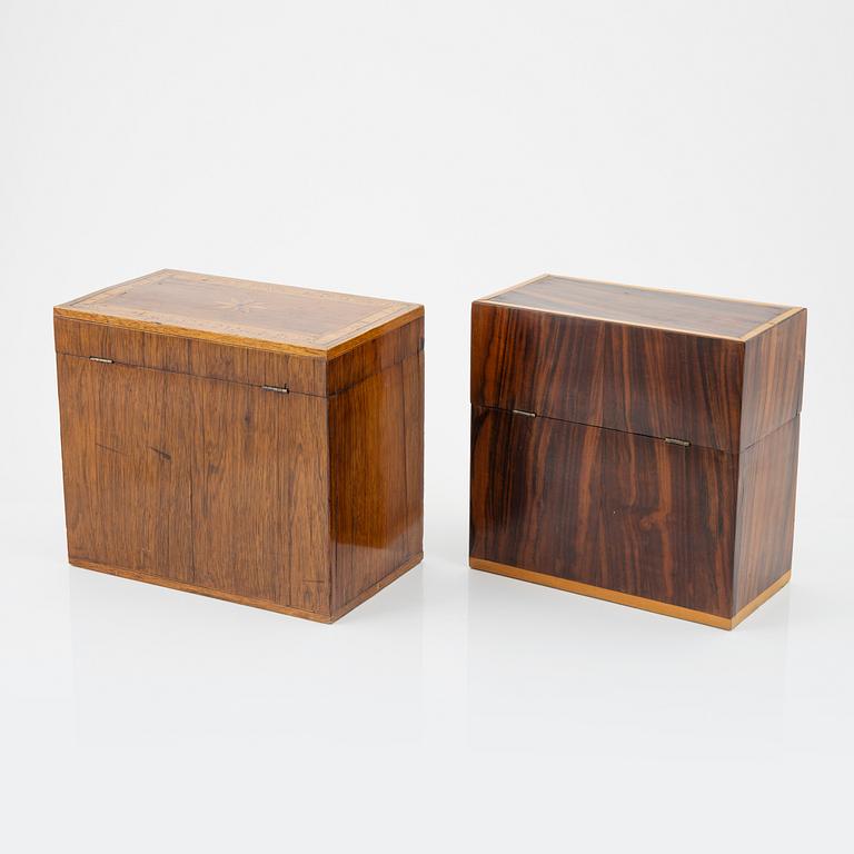A set of two chests, one with four bottles, 20th Century.