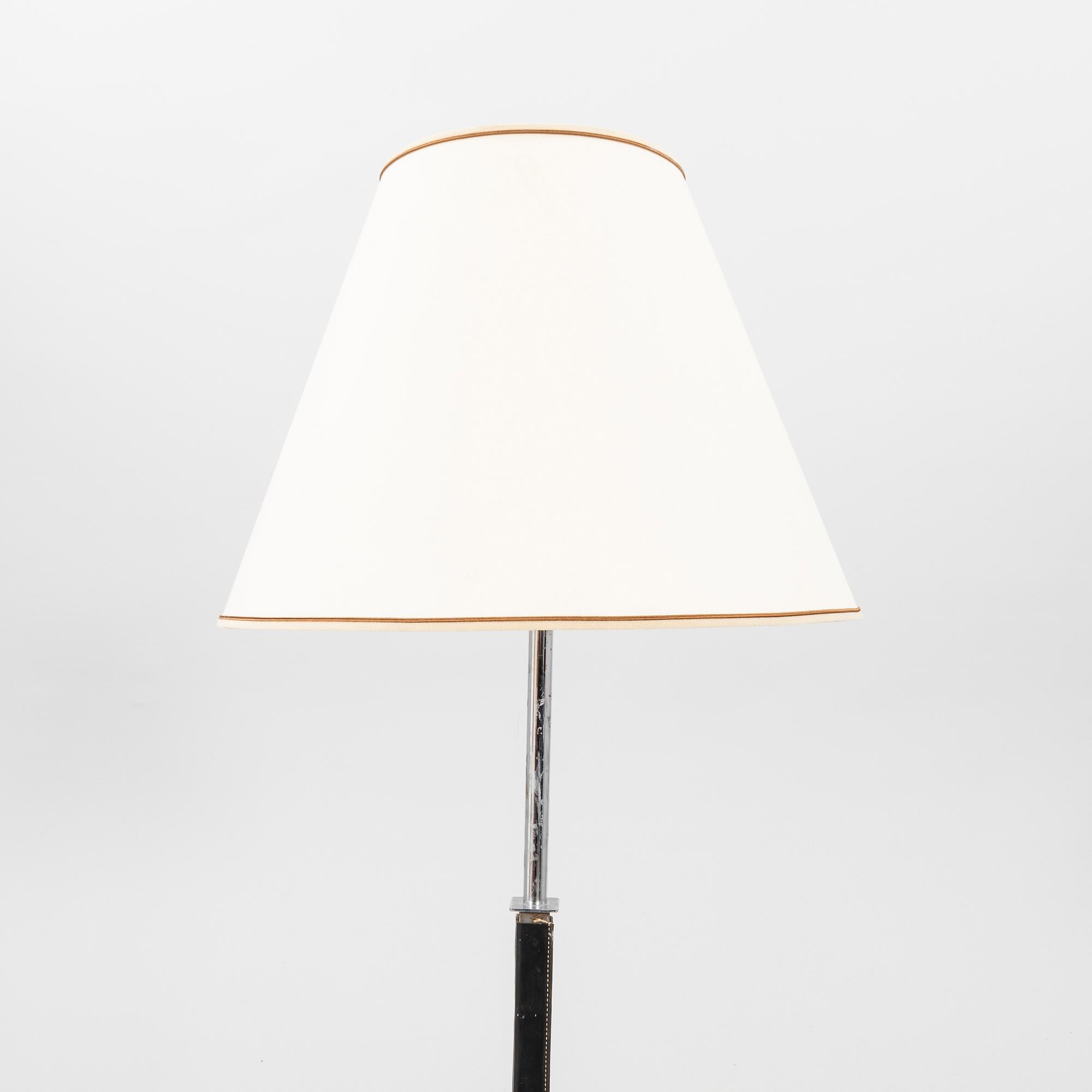 A Philips leather and chrome floor lamp model no 590A later part of the 20th century.