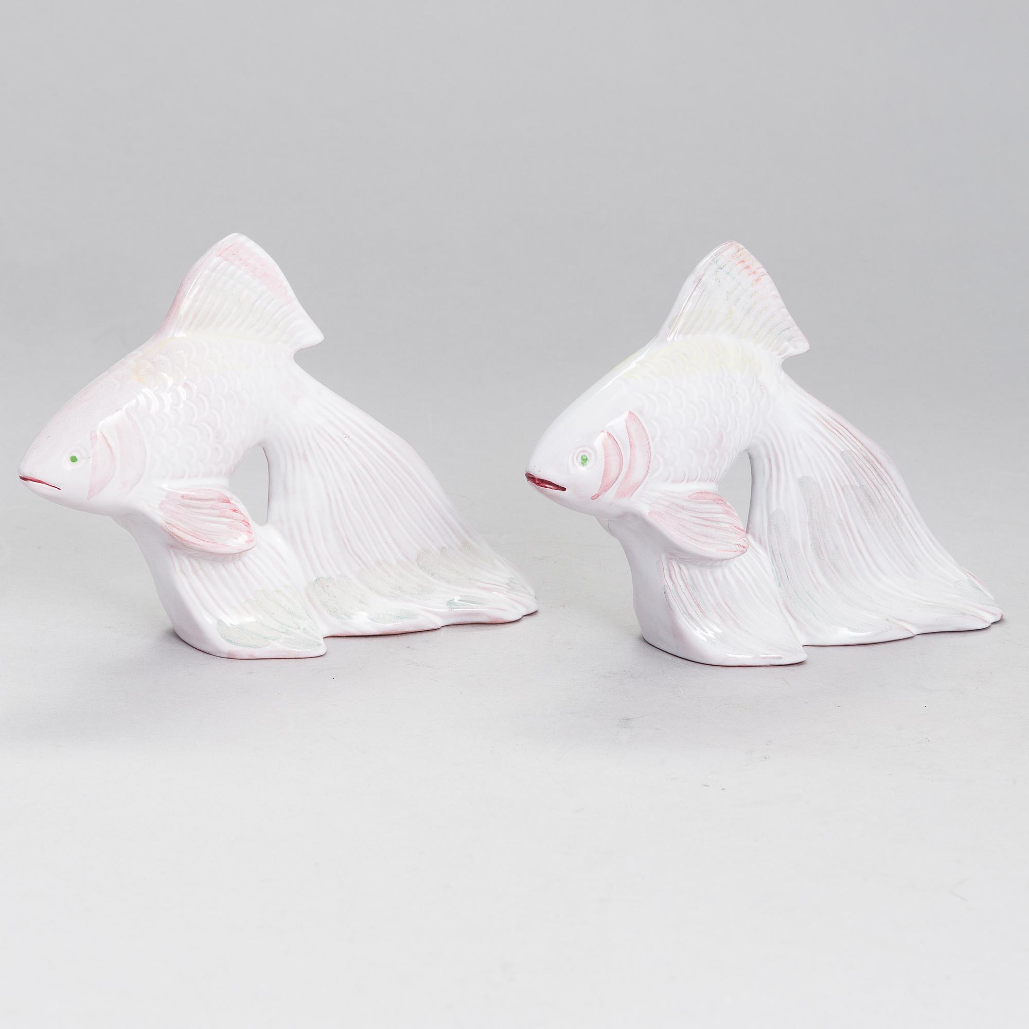 A pair of figurines by Michael Schilkin for Arabia.