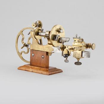 A hand powered lathe for watchmakers by R Flume in Berlin, 19th century.