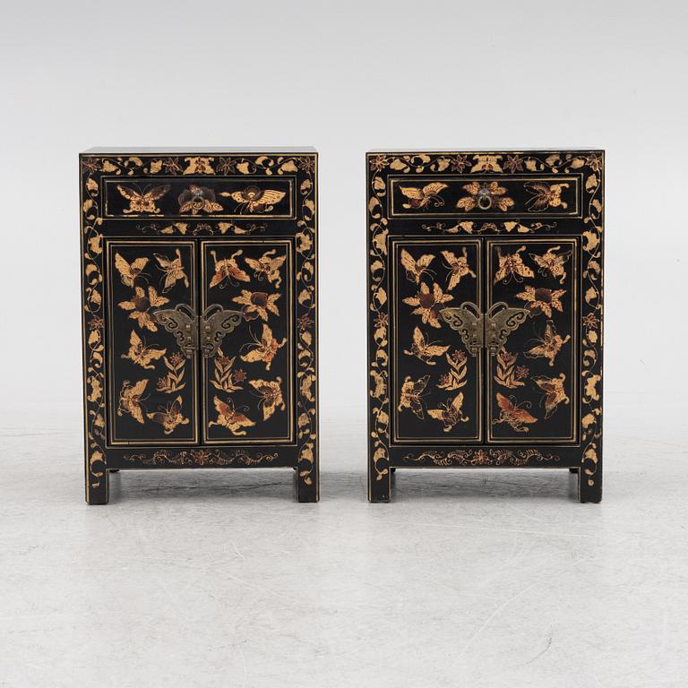 A pair of bedside tables/cabinets, China, 20th century.