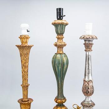 A  set of three wood table lamps from Paoletti, Firenze Italy, second half of the 20th century.