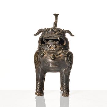 A bronze censer in the shape of a buddhist lion, Ming dynasty (1368-1644).