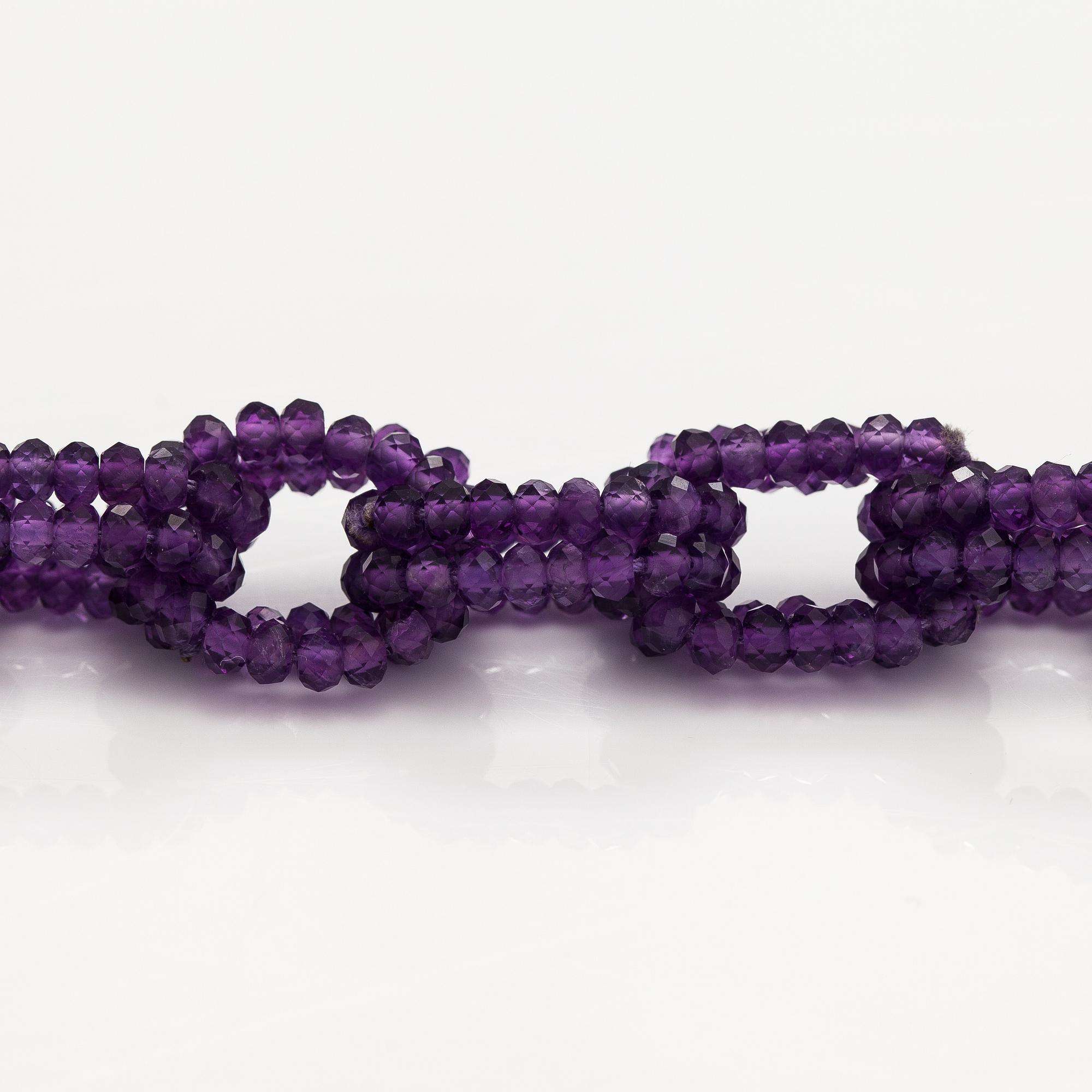 A necklace with amethysts.