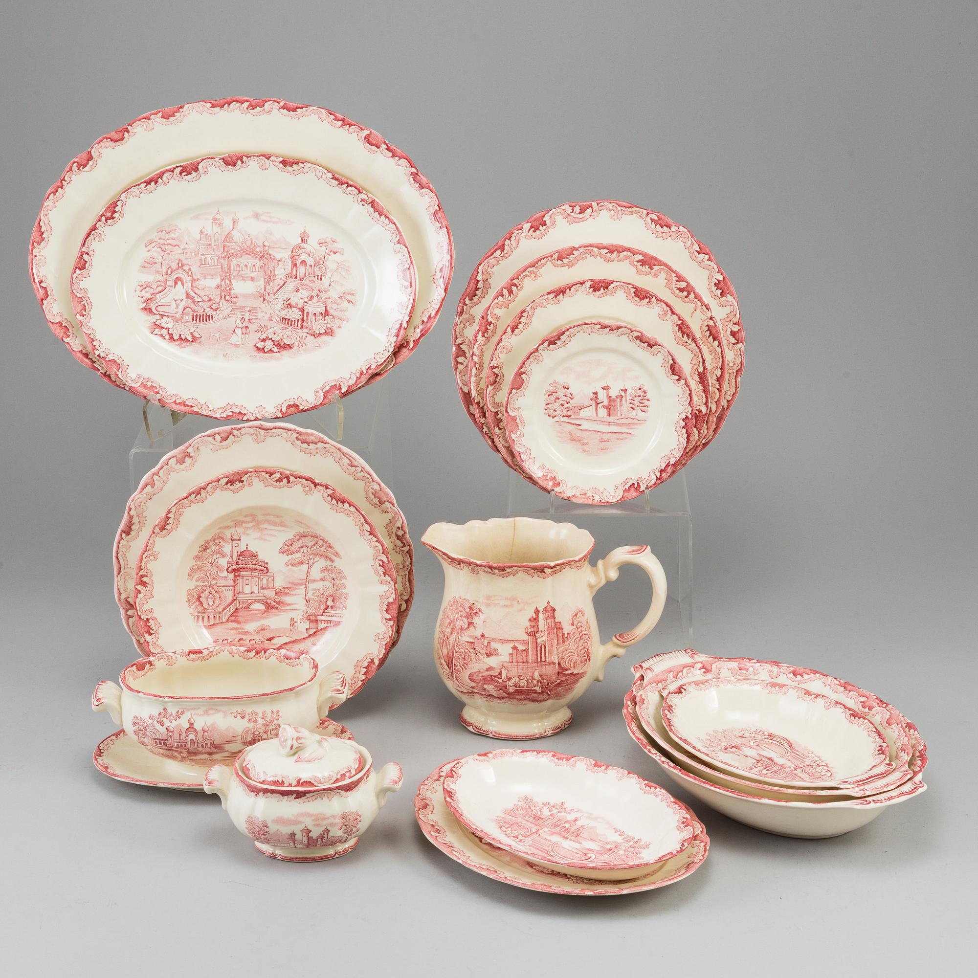 A part red 'Bengali' creamware dinner service, Rörstrand, 1948-56 (111 pieces).