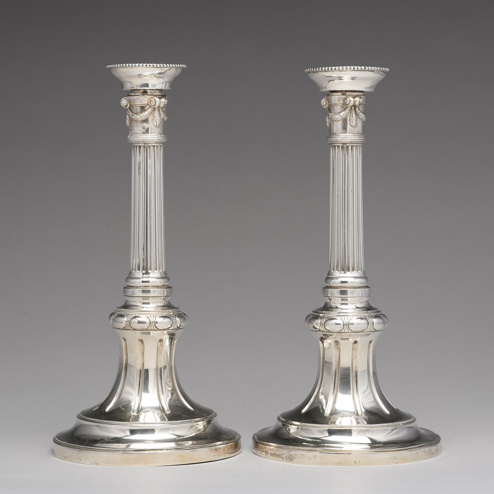 A pair of Swedish Gustavian silver candlesticks, mark of Johan Henrik Schvart, Karlskrona 1789.