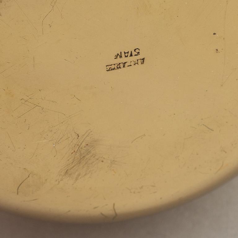 A set of eight polished brass pomme granate shaped jars with covers on stands, Marked Siam, Amfar Co.