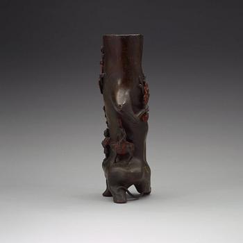 A bronze three trunk shaped vase, Qing dynasty (1644-1912).